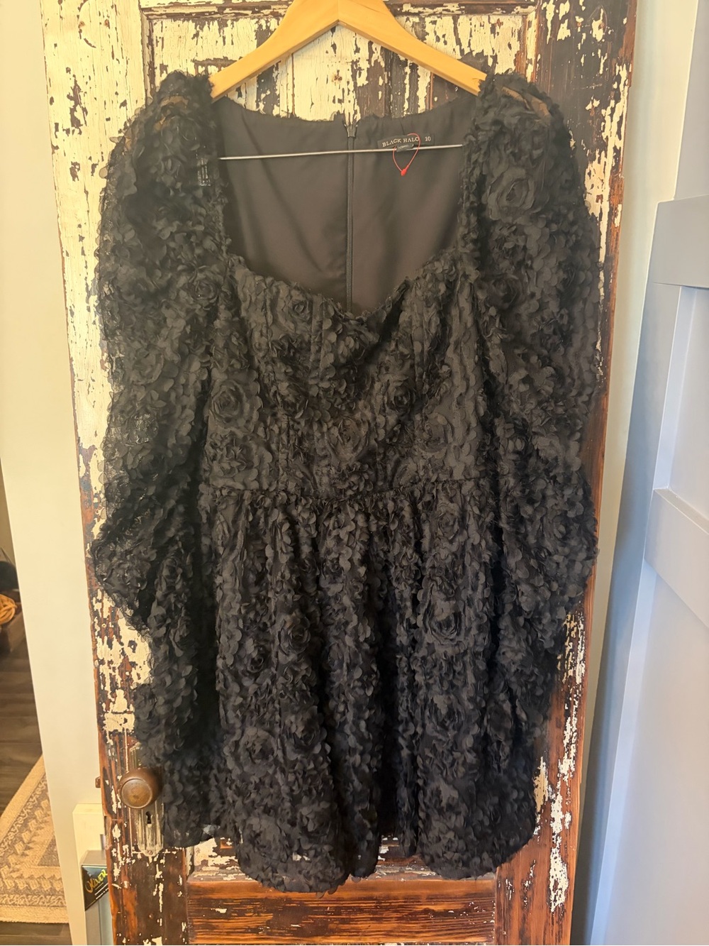 Black Halo Black Dress with Textured floral appliqué. Formal size 10. Black tie